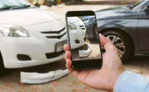 taking a photo of a car accident